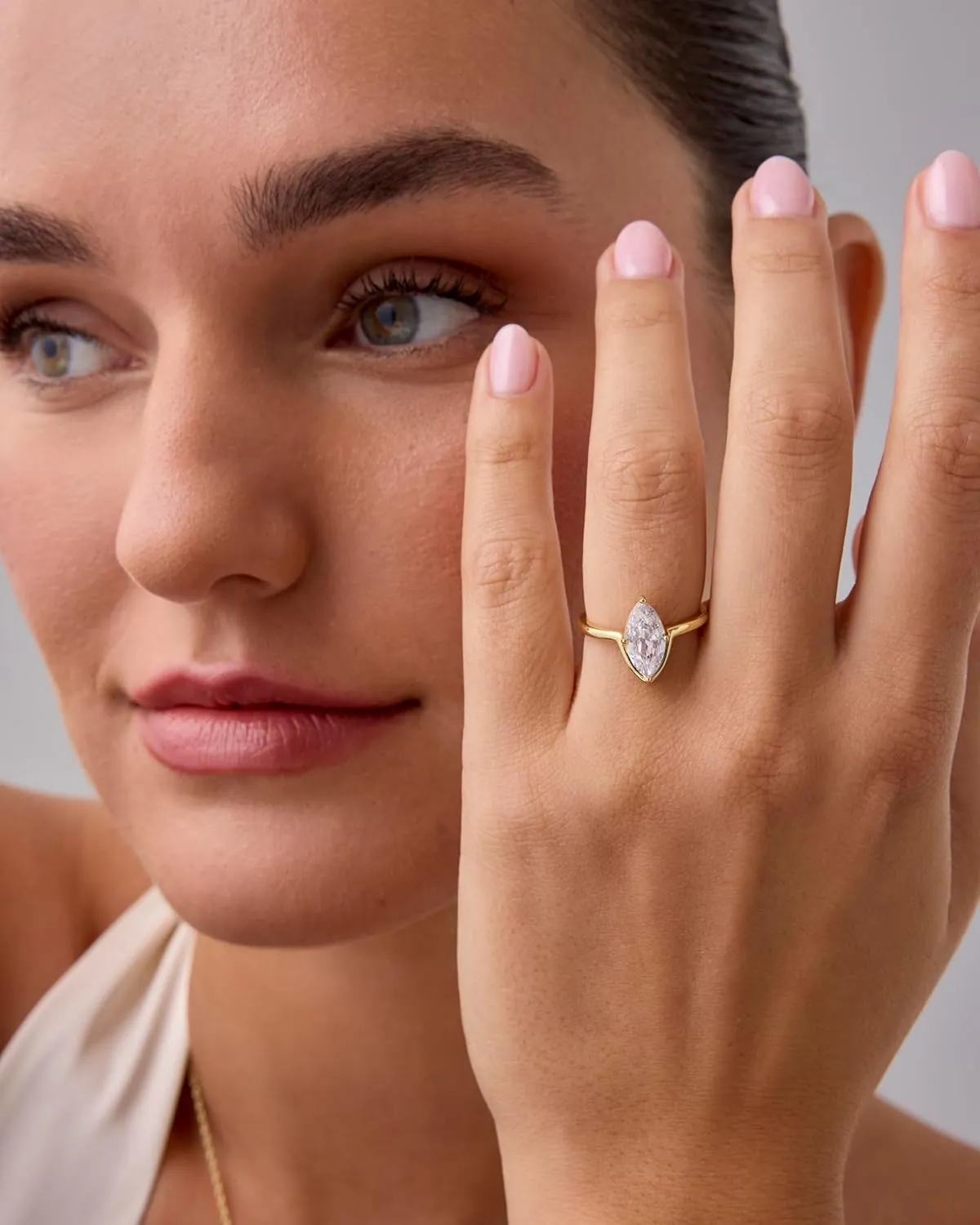 PAVOI 14K Gold Plated Marquise 1.5CT Cubic Zirconia Fake Bridal Engagement Ring for Women - Statement