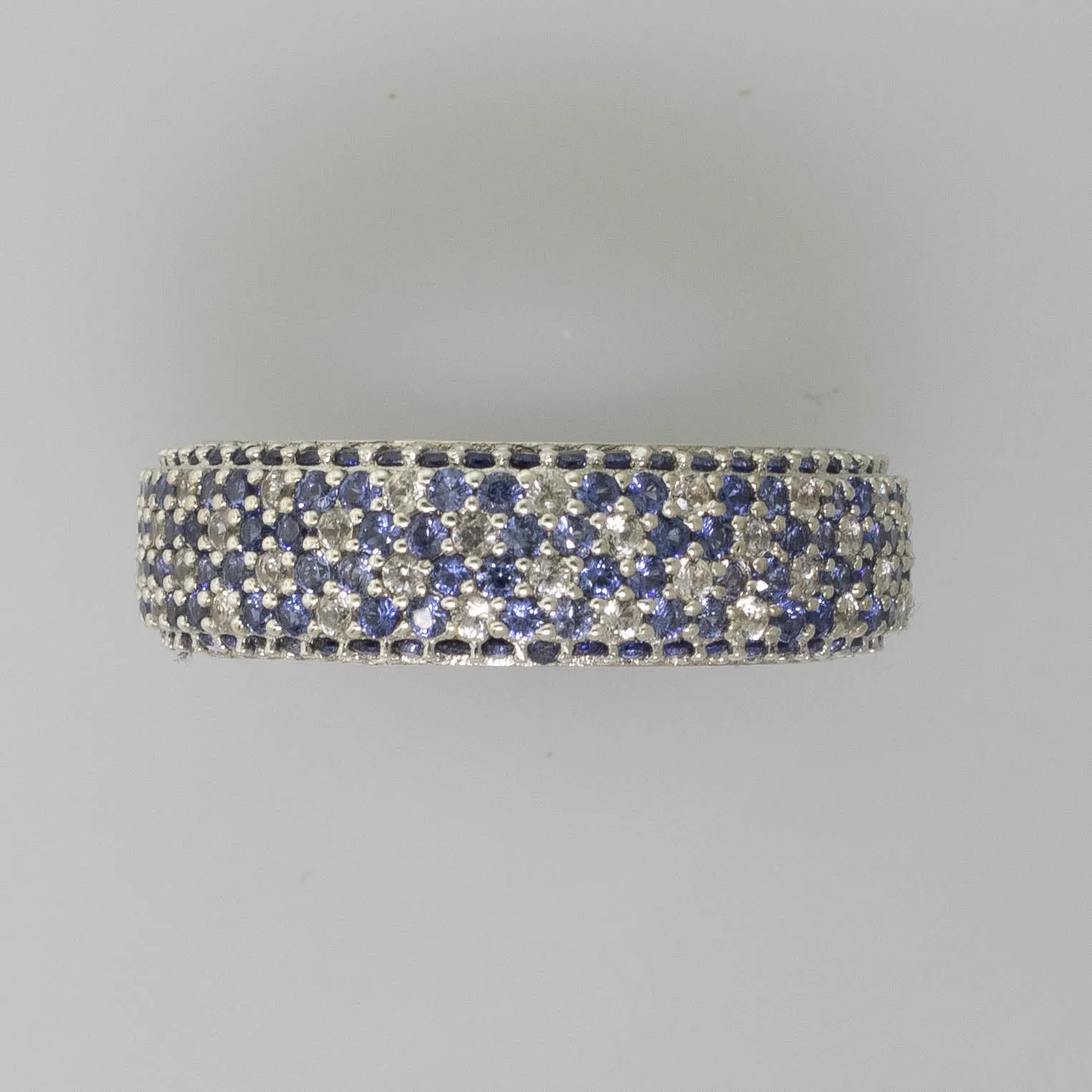 Pre-Owned Suzy Levian Simulated Blue Stone Eternity Band Ring Sterling 8.5